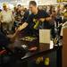 A fan greets Michigan football star Desmond Howard during an autograph signing at the M Den on Friday.  Melanie Maxwell I AnnArbor.com